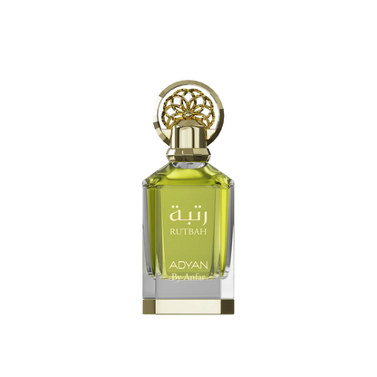 ADYAN Anfar Ruthbah perfume, featuring a clear glass bottle filled with light yellow-green liquid, a gold-tone cap with an intricate circular filigree design, and gold lettering on the front, set against a plain white background.