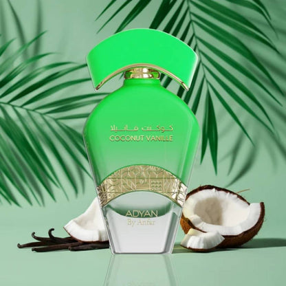 Adyan Coconut Vanille Tropical Delights perfume by Anfar with green bottle, coconut halves, vanilla pods and tropical palm leaves representing a coconut vanilla fragrance.