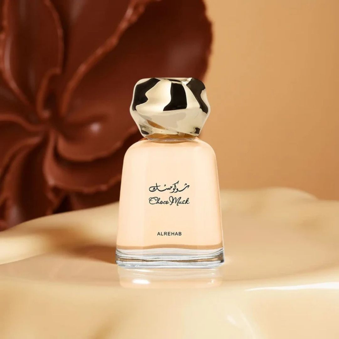 Al Rehab Choco Musk Unisex Eau De Parfum 100ml bottle on soft beige surface