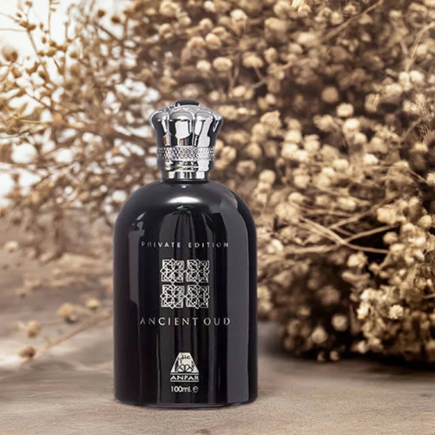 Anfar Ancient Oud Private Edition 100ml EDP bottle with dried flowers