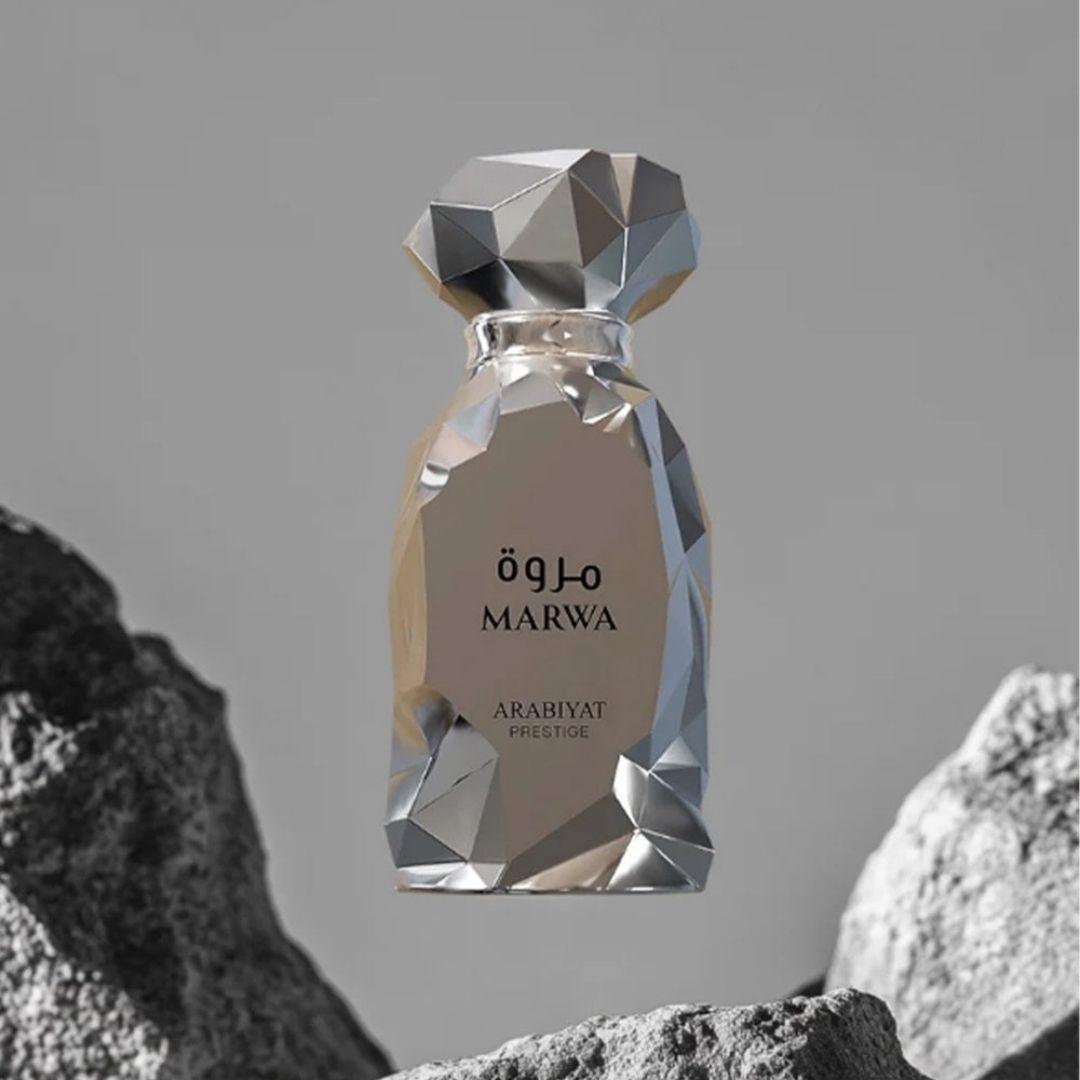 Arabiyat Prestige Marwa Eau de Parfum 100ml for Men bottle on rocks in monochrome setting