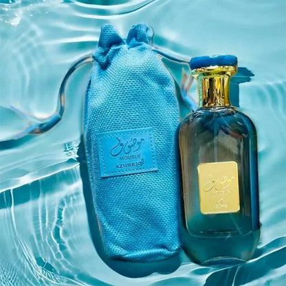 Ard Al Zaafaran Mousuf Azure Unisex EDP 100ml bottle and pouch in blue water setting