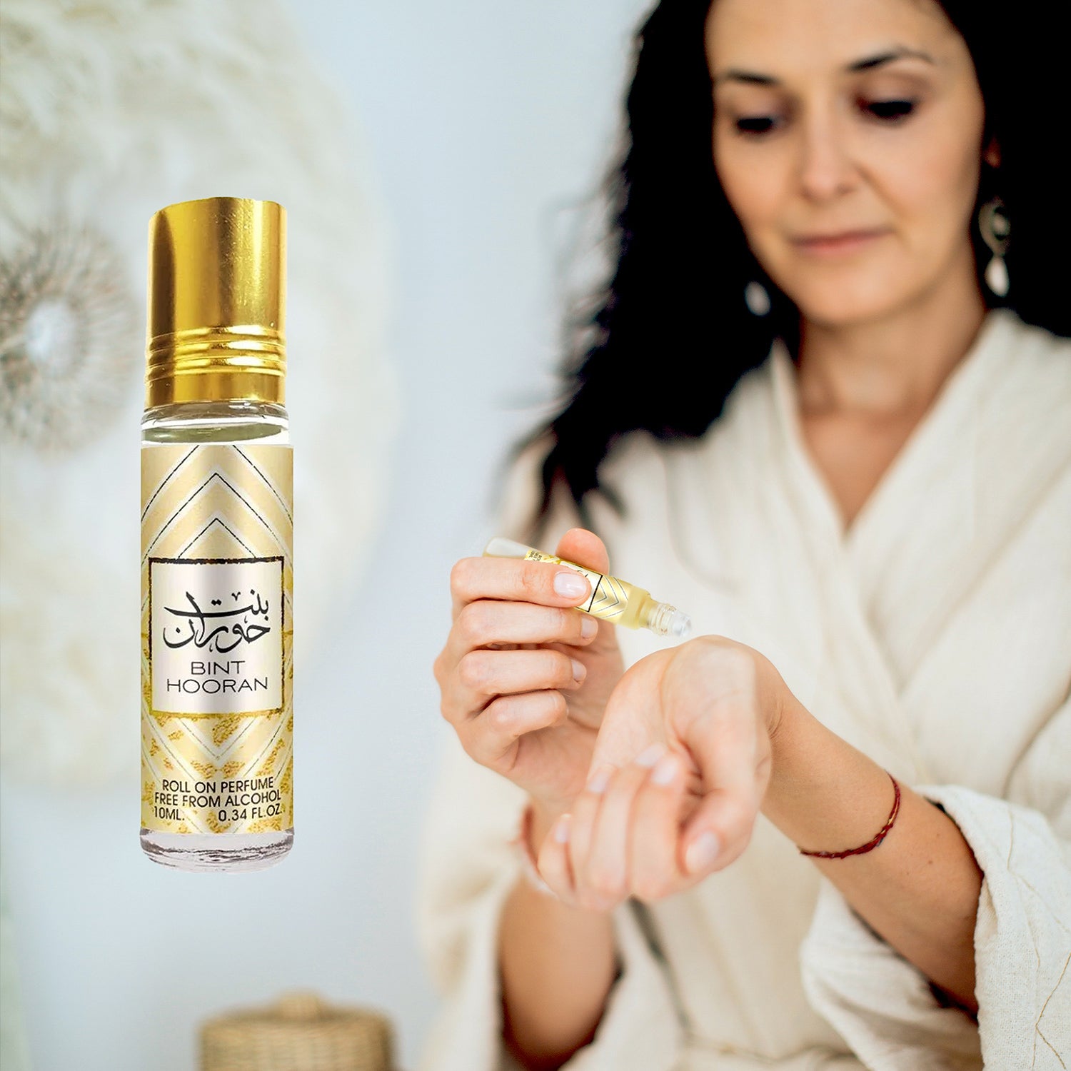 Bint Hooran 10ml Oil Roll On for Women Ard Al Zaafaran applying on to wrist