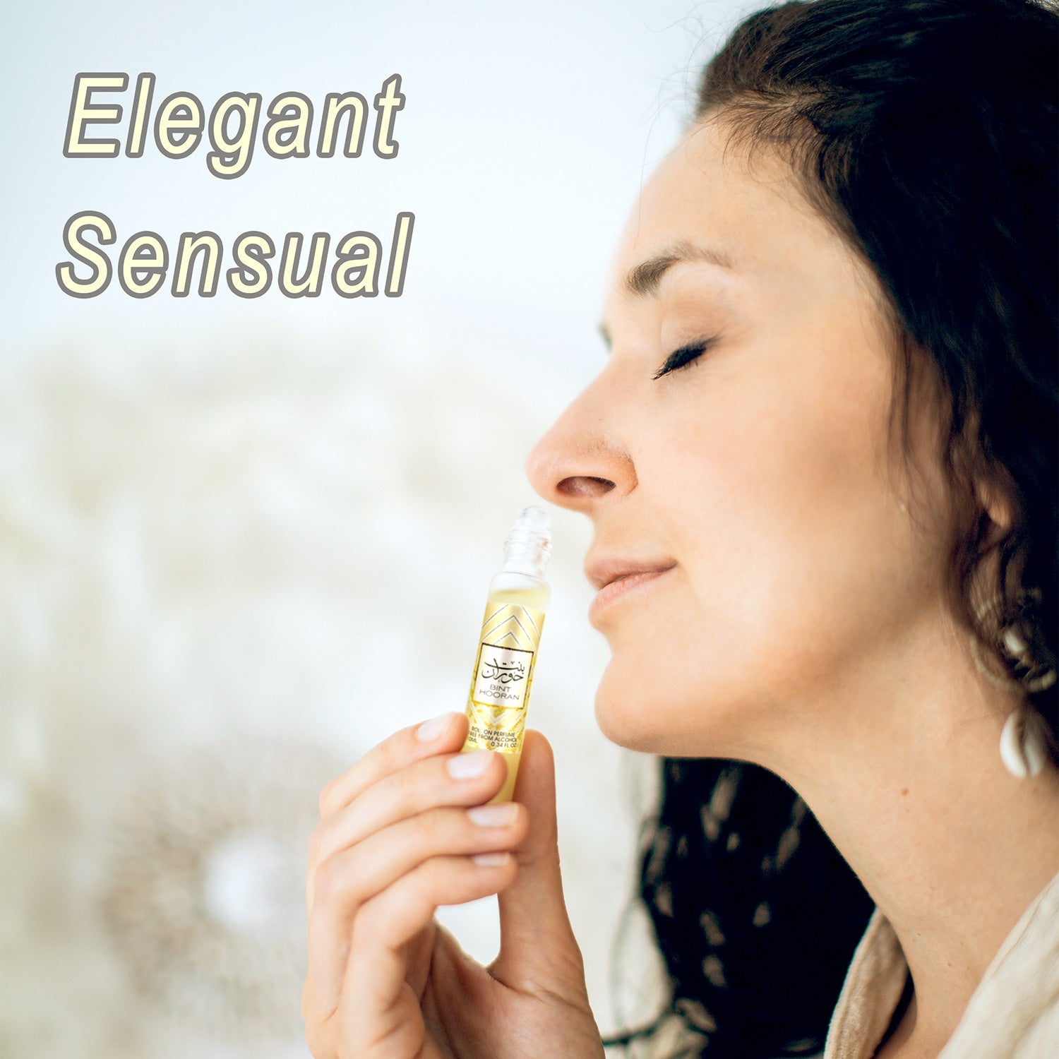 Bint Hooran 10ml Oil Roll On for Women Ard Al Zaafaran women smelling the amazing perfume roll on