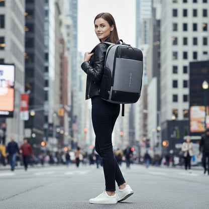 Woman with a backpack walking on a city street best travel laptop backpack multi-functional