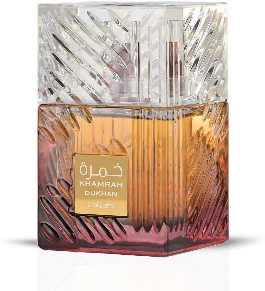 Perfume bottle with textured glass design and 'Khamrah Dukhan' label on a white background