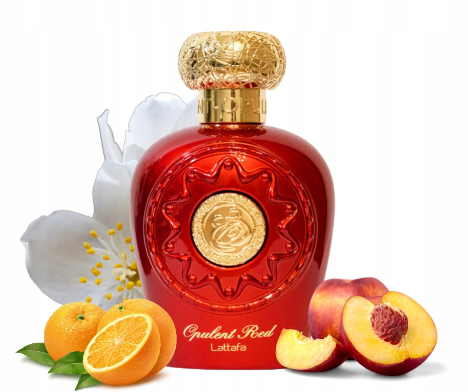 Lattafa-Opulent-Red perfume bottle with gold cap surrounded by oranges, peaches, and a white flower on a white background