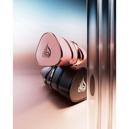 Lattafa Yara Elixir 100ml EDP For Women two bottles on reflective surface