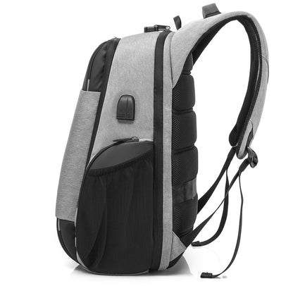 Gray and black backpack with USB port on a white background best travel laptop backpack multi-functional