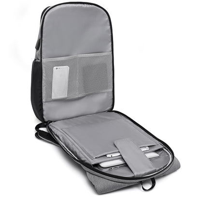 Gray backpack with open compartment showing organized items on a white background best travel laptop backpack multi-functional