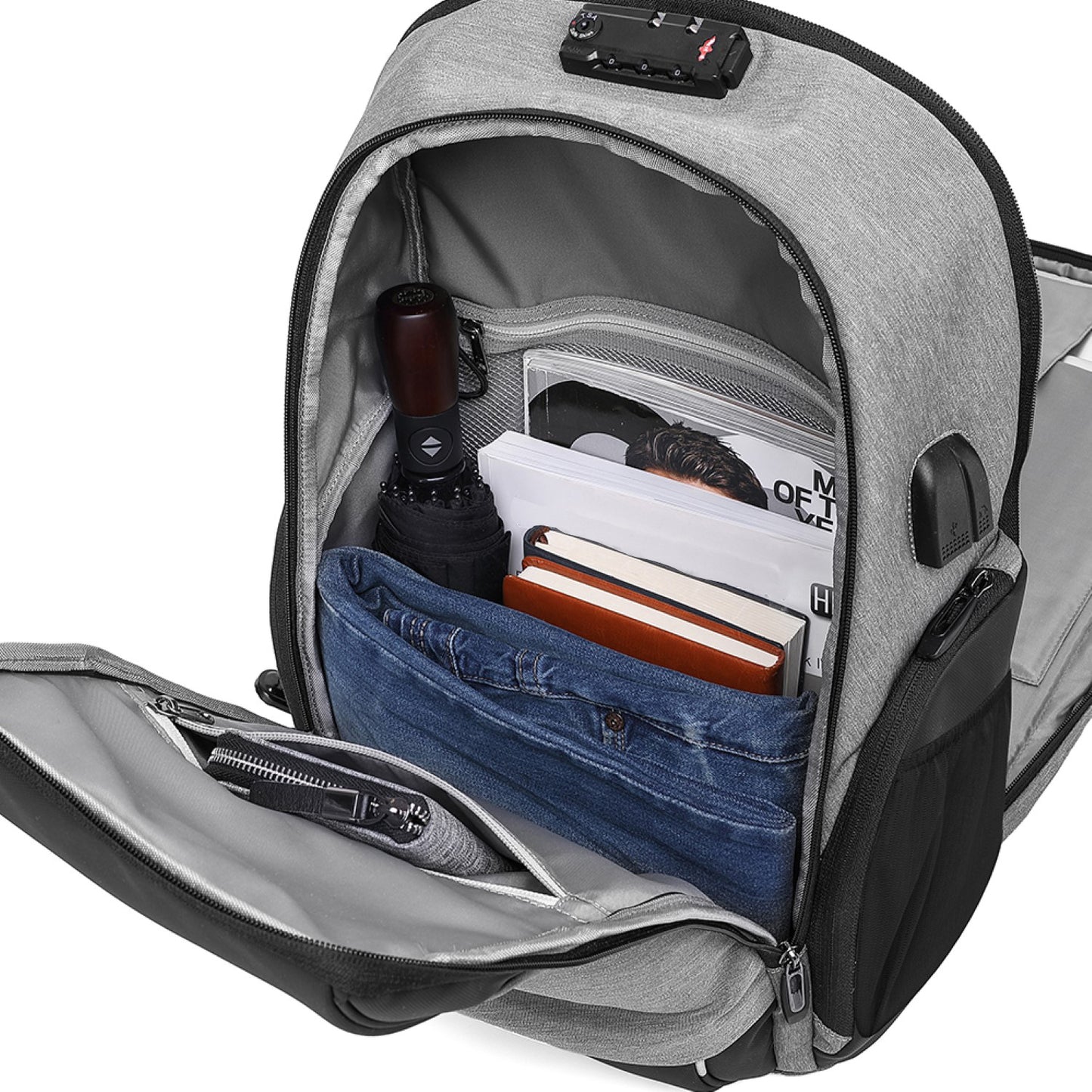 Gray backpack with compartments open, showing items inside on a white background best travel laptop backpack multi-functional