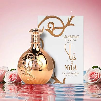 Nyla 80ml EDP by Arabiyat Prestige floral waters with flowers and water with pink background