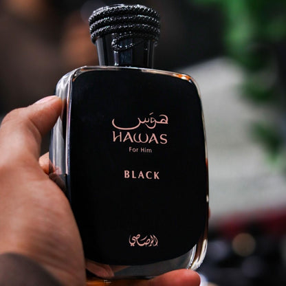 Rasasi Hawas Black Eau de Parfum 100ml bottle held in hand close view