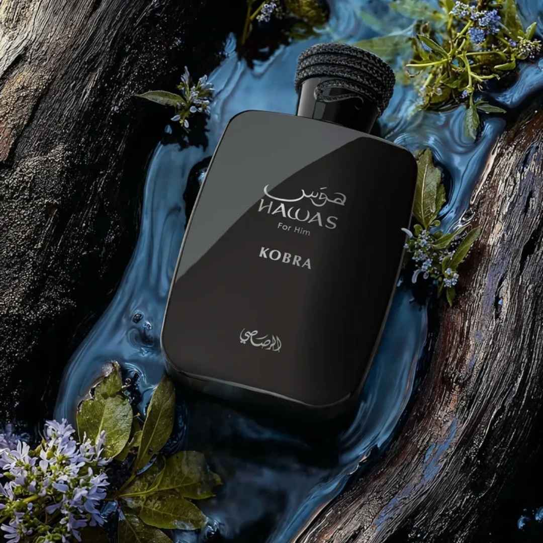 Rasasi Hawas Kobra Eau de Parfum 100ml bottle on wet rocks with plants