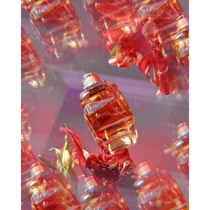 Rave Women Eau de Parfum bottle with reflective gems