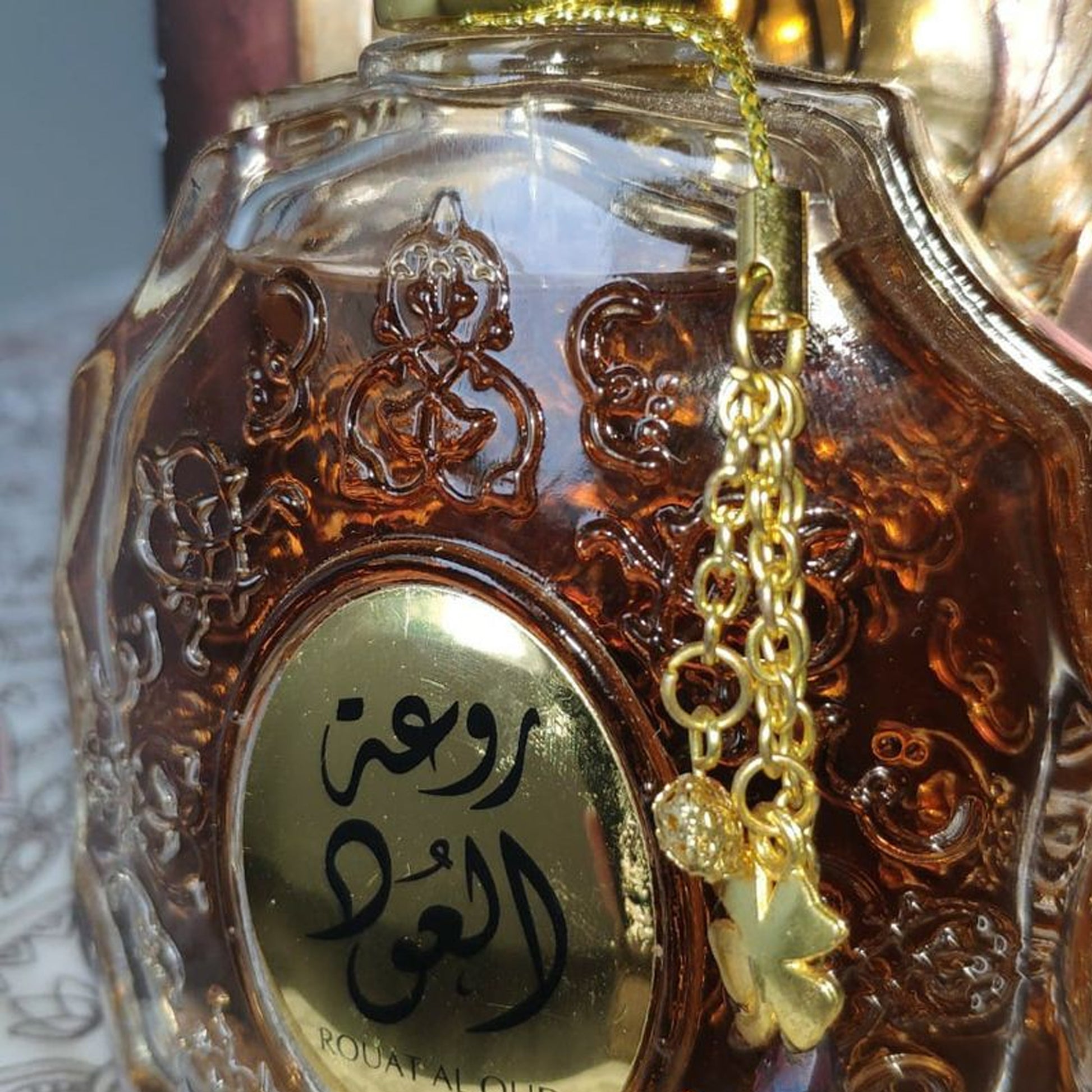 Rouat Al Oud Eau De Parfum 100ml by Lattafa close up of bottle