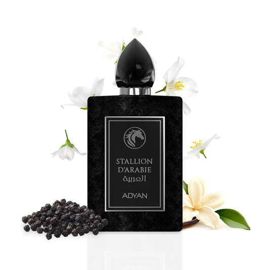 Black perfume bottle labeled 'Stallion d'Arabie' by Adyan with flowers and spices on a white background