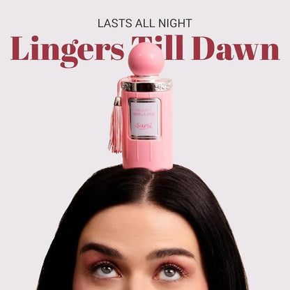 Sapil Naughty Vanilla Oud Unisex EDP 100ml Pink perfume bottle on a woman's head with text 'Lasts All Night Lingers Till Dawn' on a light pink background