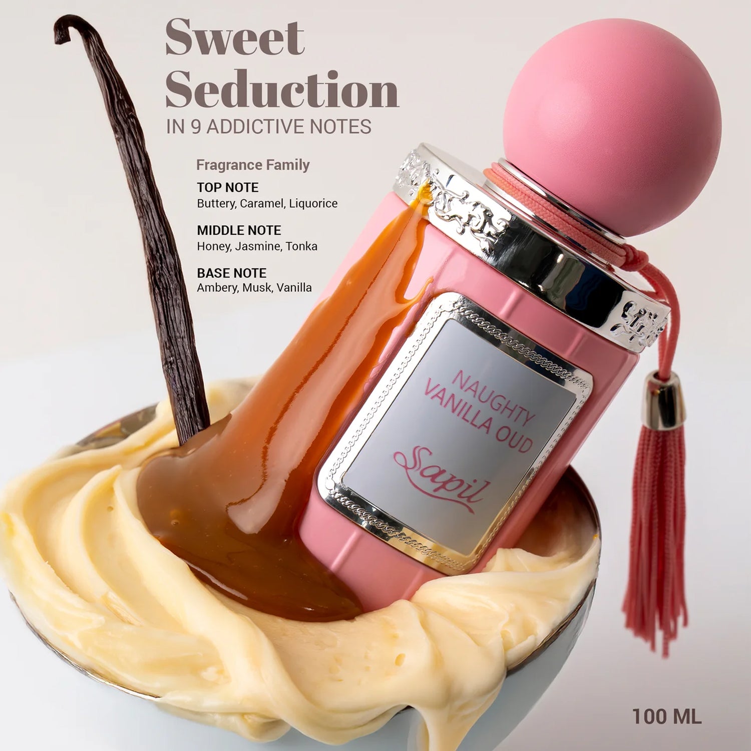 Pink perfume bottle labeled 'Naughty Vanilla Oud' with vanilla ice cream and a vanilla bean on a light gray background.