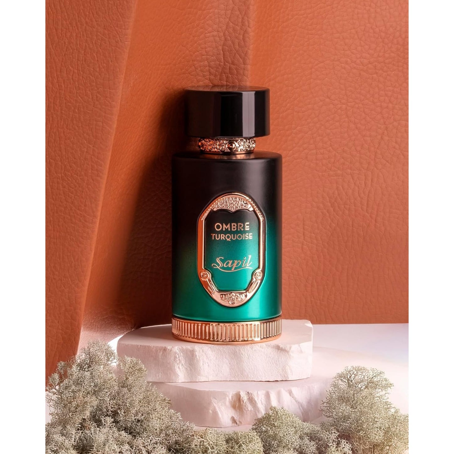Sapil Ombre Turquoise Eau de Parfum 100ml bottle on soft leather background