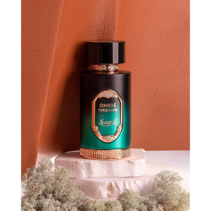 Sapil Ombre Turquoise Eau de Parfum 100ml bottle on soft leather background