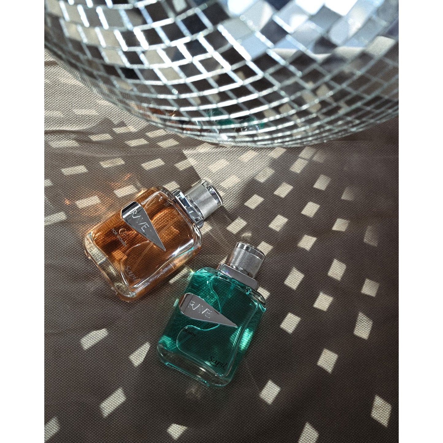 Sapil Rave Women Eau de Parfum bottle with disco light reflections