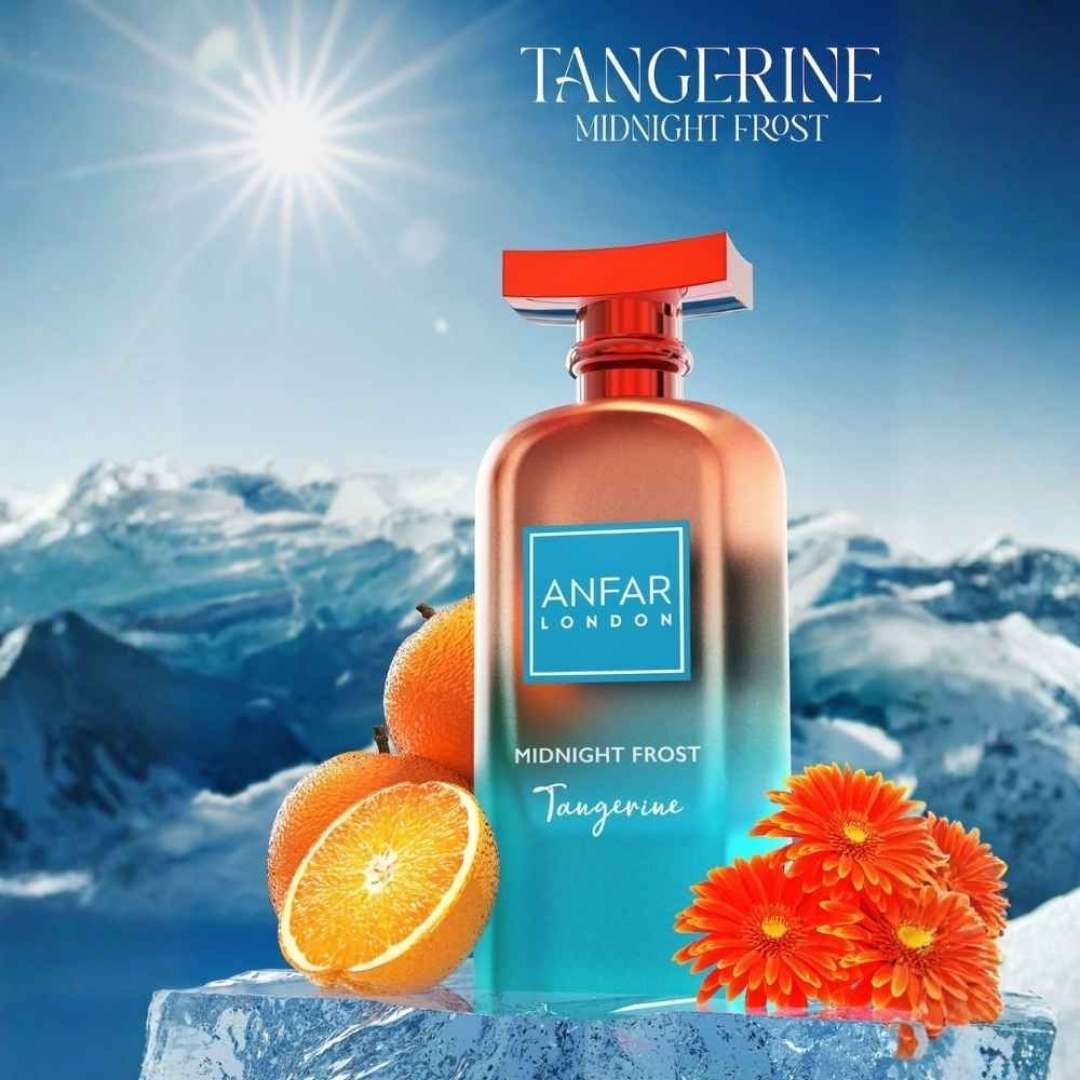 Anfar London Midnight Frost Tangerine extrait de parfum with fresh tangerine and floral notes displayed in a bright alpine mountain setting.