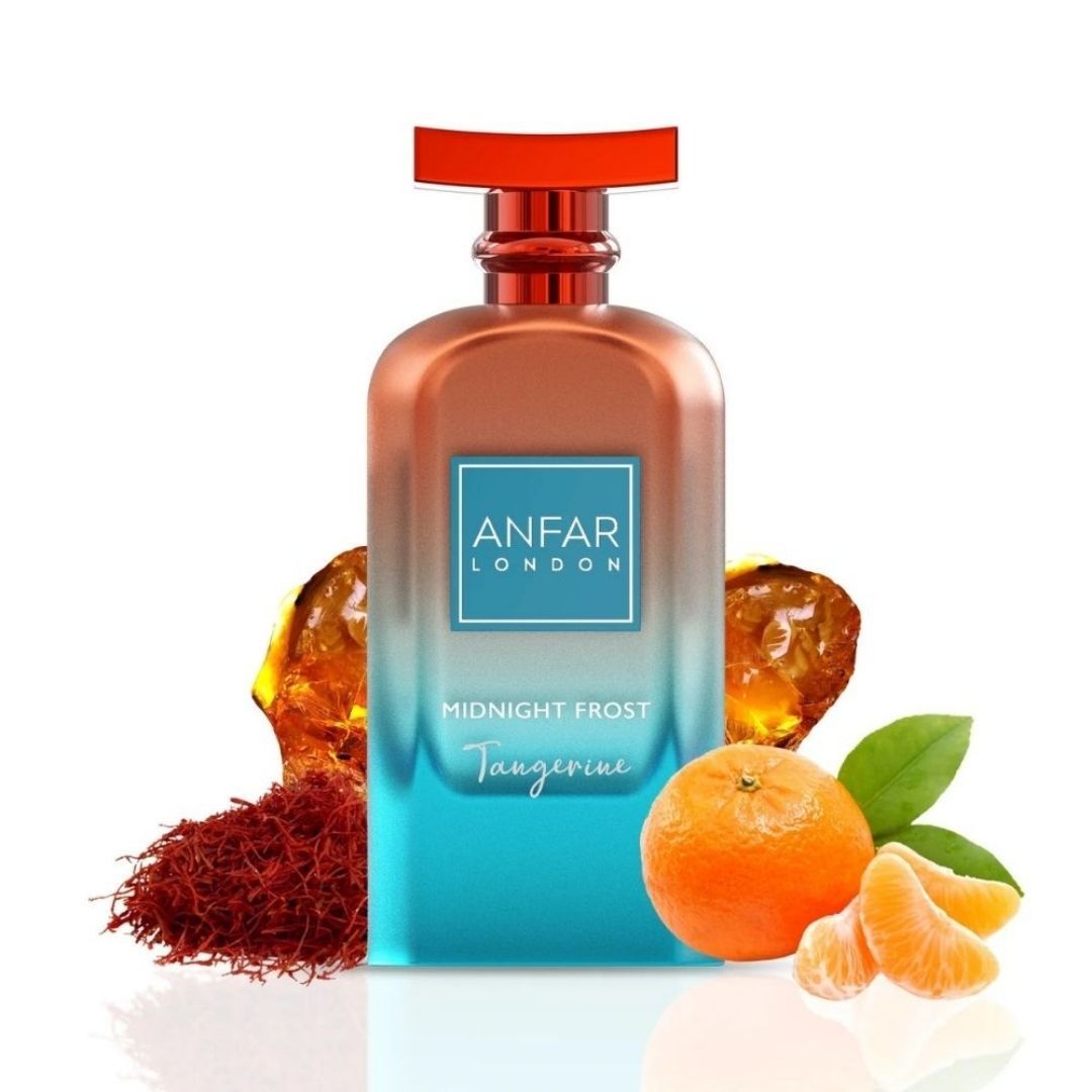 Anfar London Midnight Frost Tangerine extrait de parfum with tangerine, saffron, and amber fragrance notes displayed beside the luxury citrus-inspired perfume bottle and vibrant floral accents.