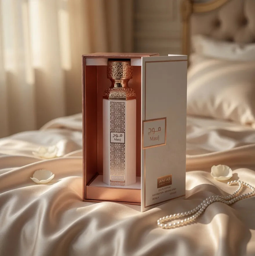 Anfar Mauj bottle inside its open presentation box on cream fabric