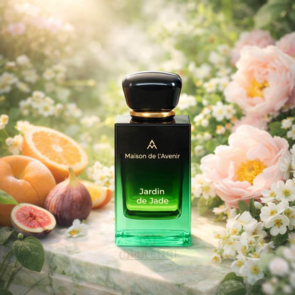 Maison de l’Avenir Jardin de Jade eau de parfum bottle displayed with orange, fig, and blooming flowers in a garden setting, representing a fresh fruity floral luxury fragrance.
