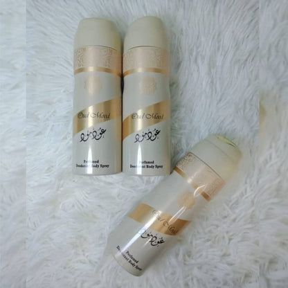 Oud Mood perfumed deodorant body spray by Lattafa featuring luxury oud fragrance deodorant cans displayed on a soft white background.