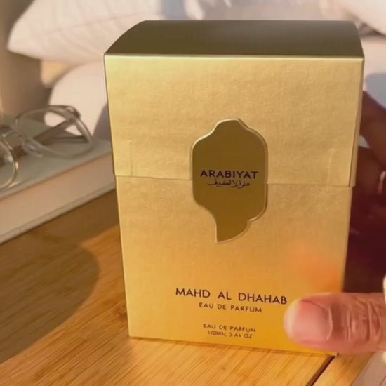 Arabiyat Prestige Mahd Al Dhahab EDP 100ml box on wooden table