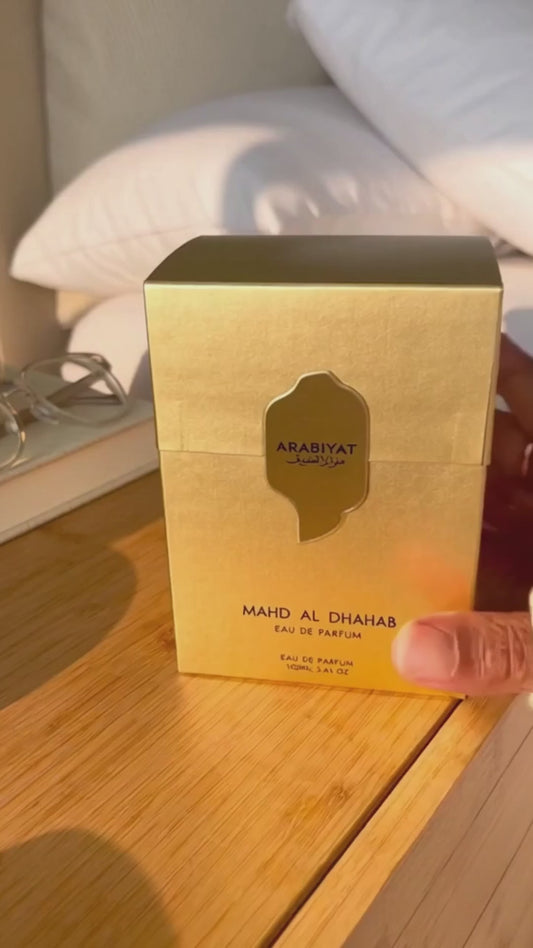 Arabiyat Prestige Mahd Al Dhahab EDP 100ml box on wooden table