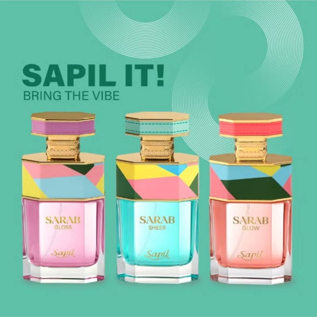 Sapil Sarab perfume collection featuring Sarab Gloss, Sarab Sheer, and Sarab Glow Eau De Parfum bottles with colorful geometric caps and “Sapil It Bring the Vibe” slogan.