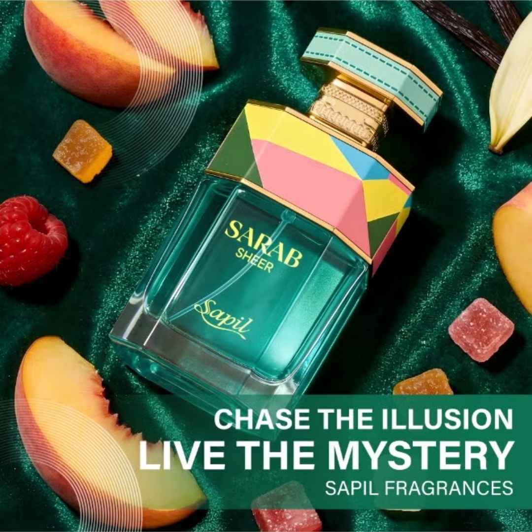 Sapil Sarab Sheer Eau De Parfum turquoise perfume bottle with colorful geometric cap surrounded by peach slices, raspberries, and candy pieces luxury fragrance by Sapil.